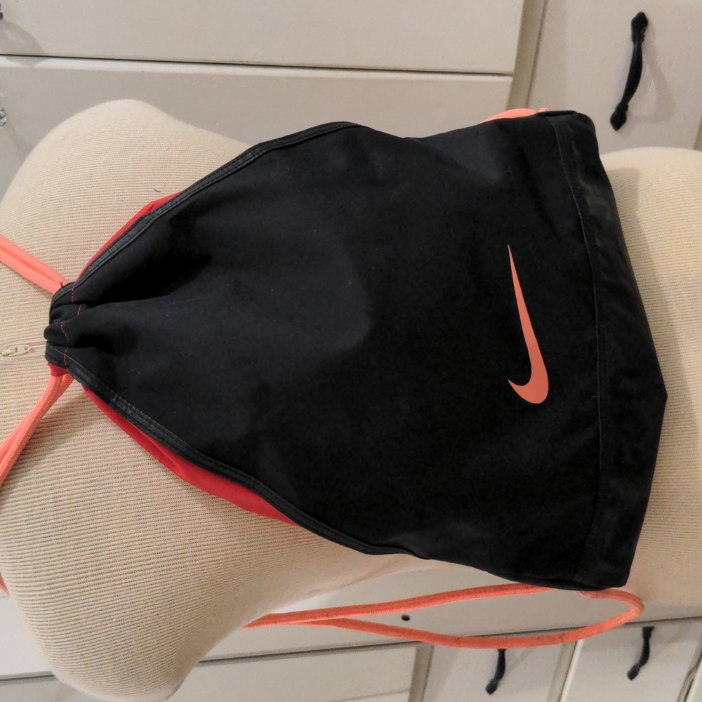 Nike pink and black cinch backpack